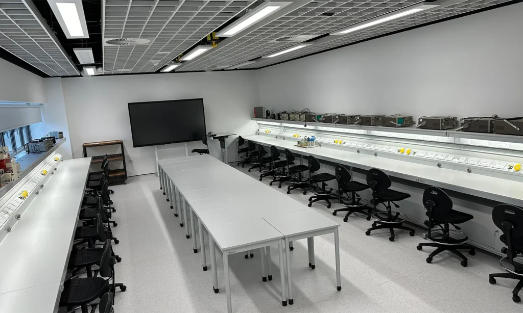 Electrical engineering classroom at Leicester College with CBW electronics workbenches