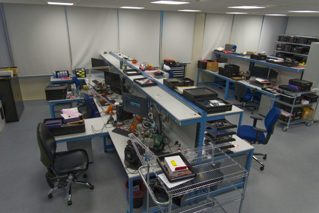Full lab overview of ESD safe industrial workbenches designed and installed by Nortek