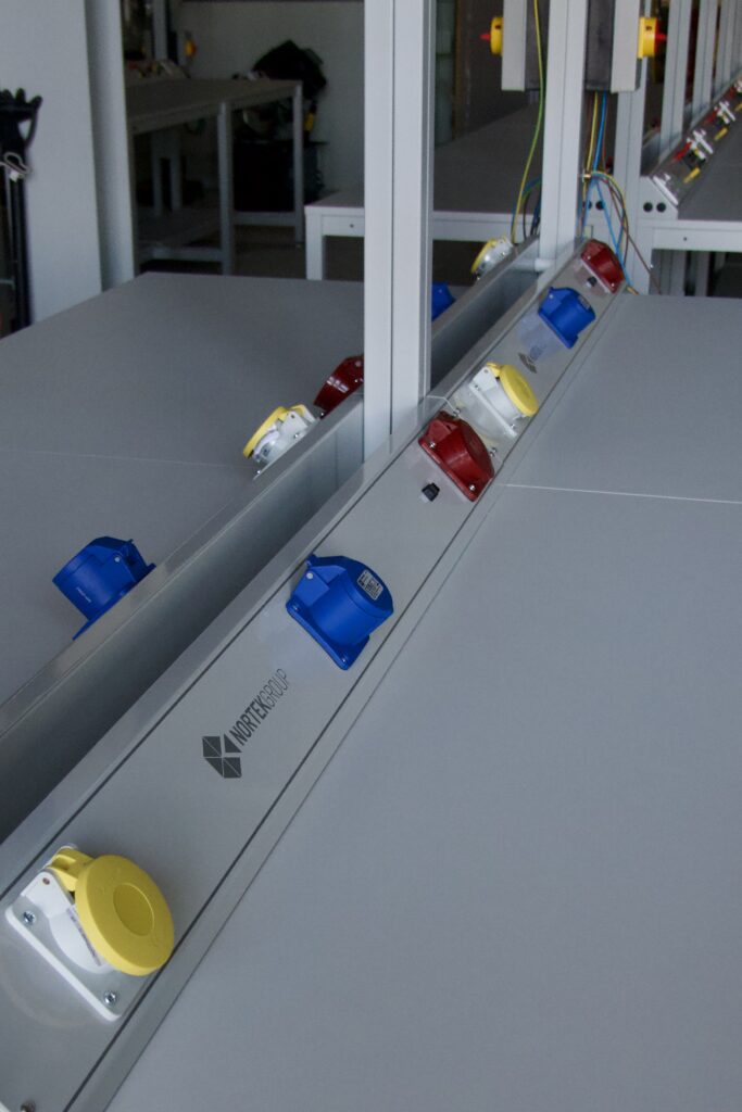 Different types of power ports on desk power trunking